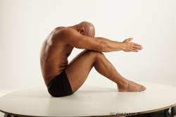 Underwear Man Black Sitting poses - simple Muscular Bald Sitting poses - ALL Academic